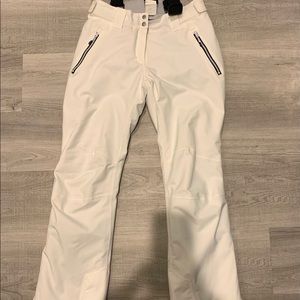 BRAND NEW. Women’s white ski/snowboard pants.